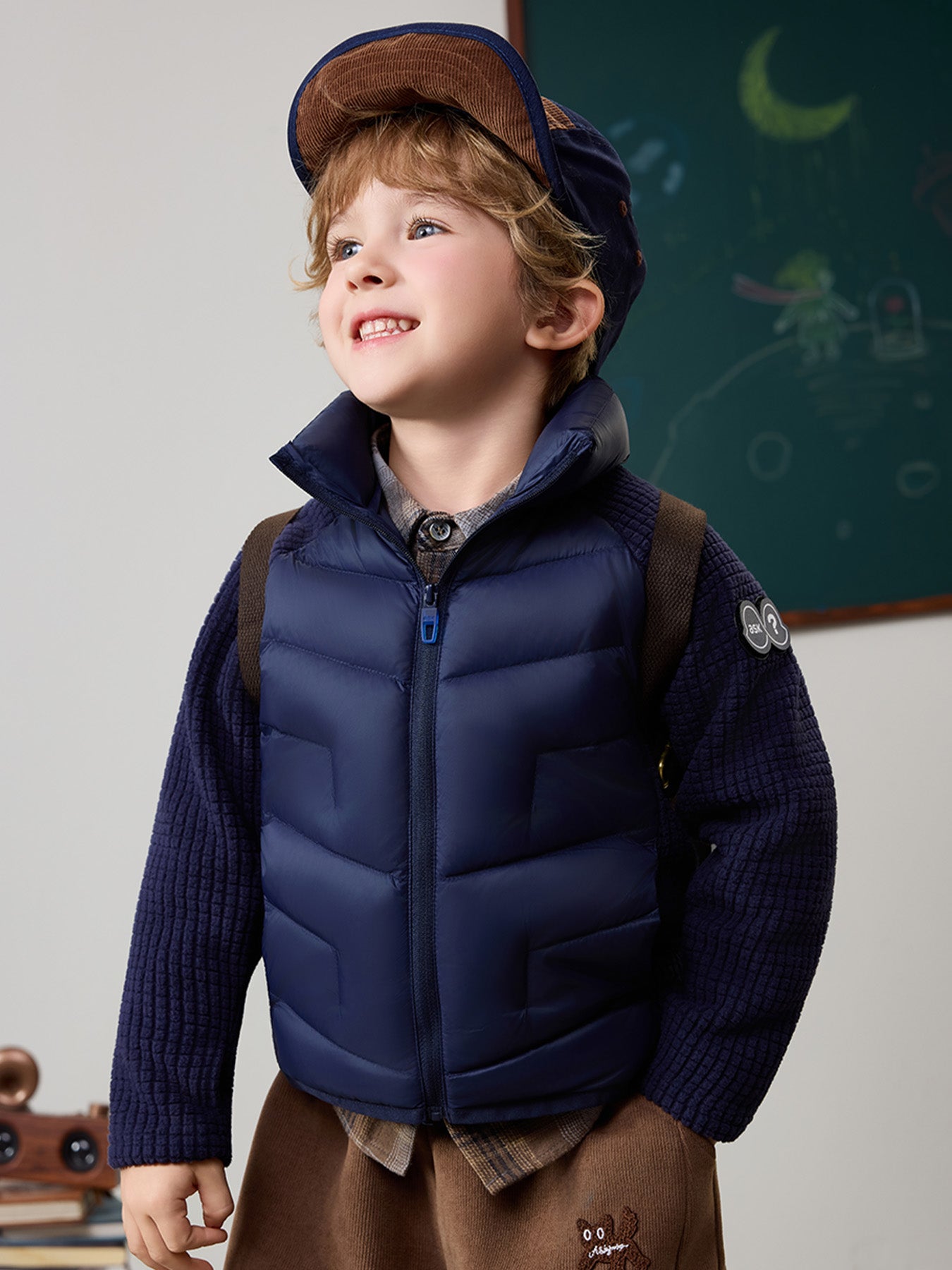 Leichte Kinderjacke mit weißen Gänsedaunen