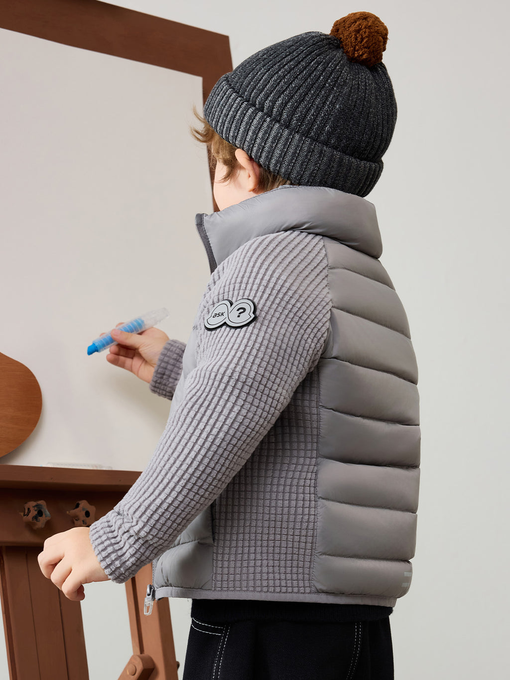 Leichte Kinderjacke mit weißen Gänsedaunen